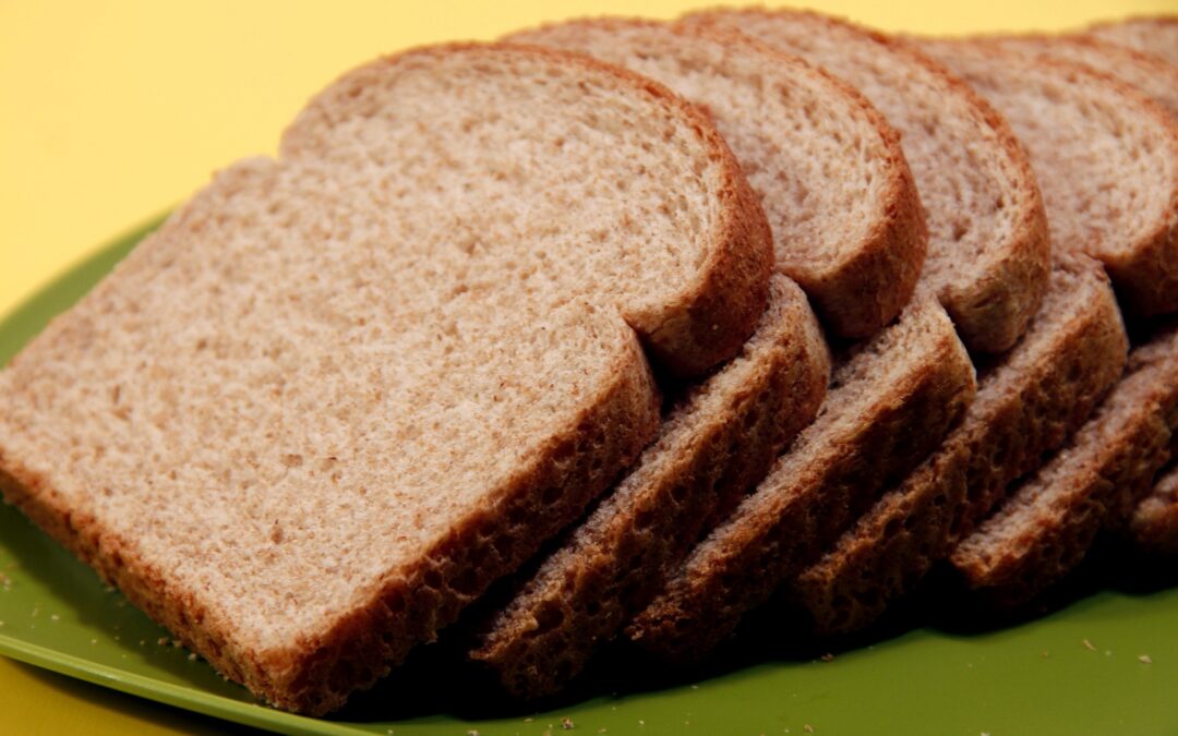 Slices of brown bread laid out on a plate